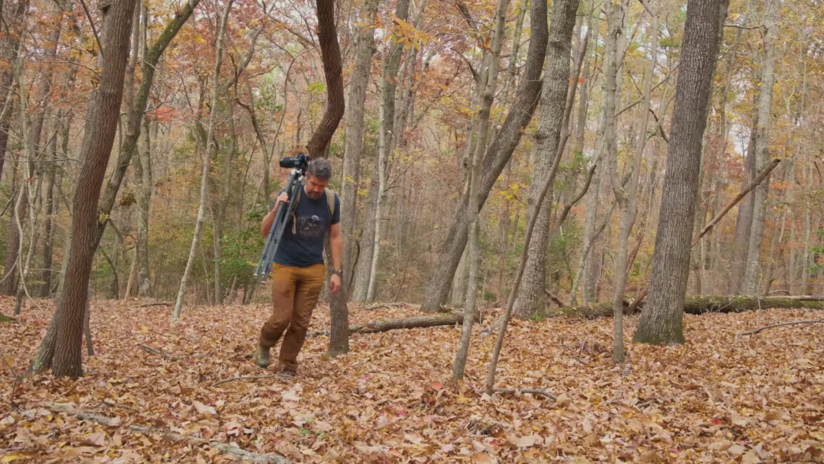 Mark Denney at a landscape location, camera on tripod, static scene