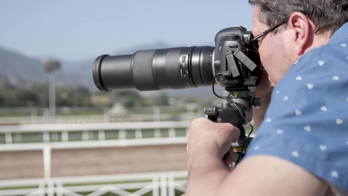 Tamron 100-400mm lens mounted on camera body