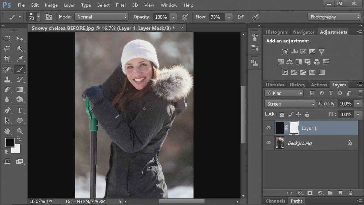 Layer mask added, brush erasing snow from foreground subject