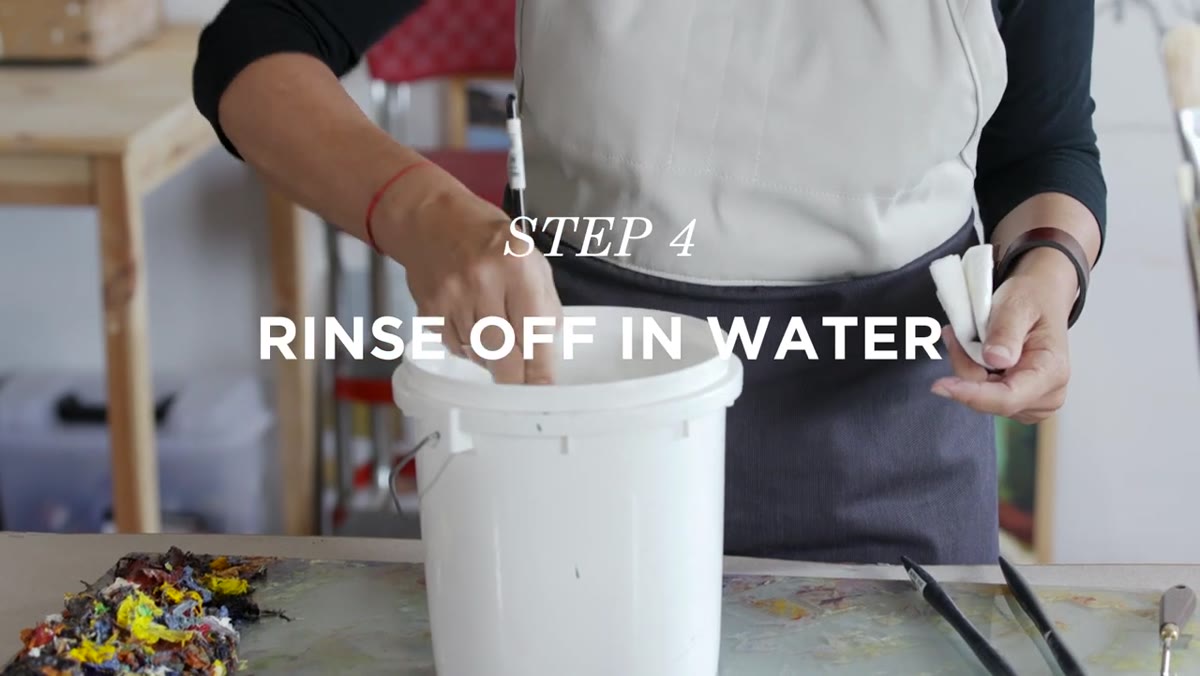 Brush rinsed under running water, clean bristles visible
