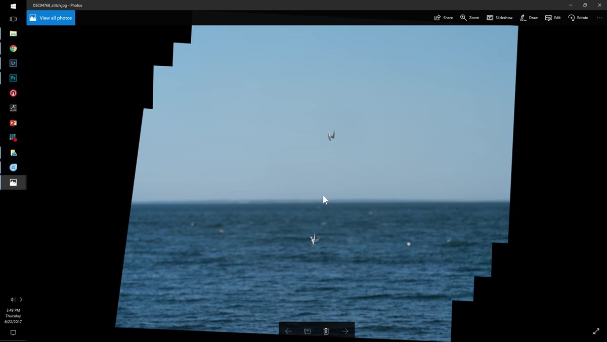 The completed panorama file open in Photoshop, showing full width