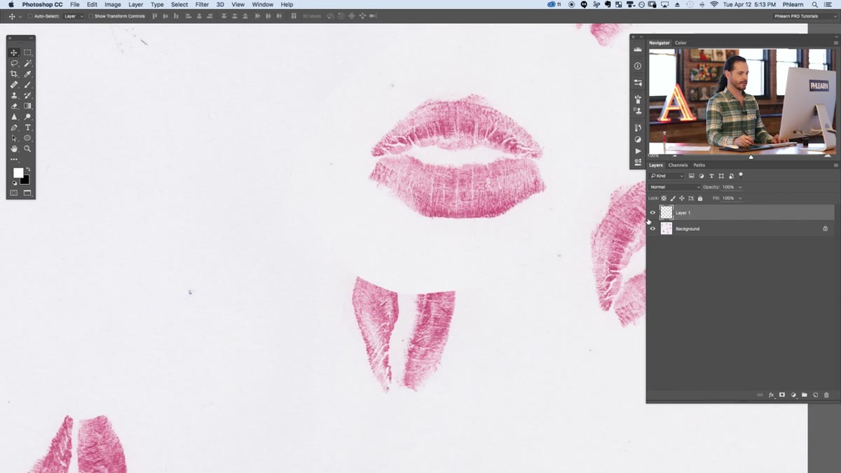 Clone stamp tool being used to clean smudges around the kiss