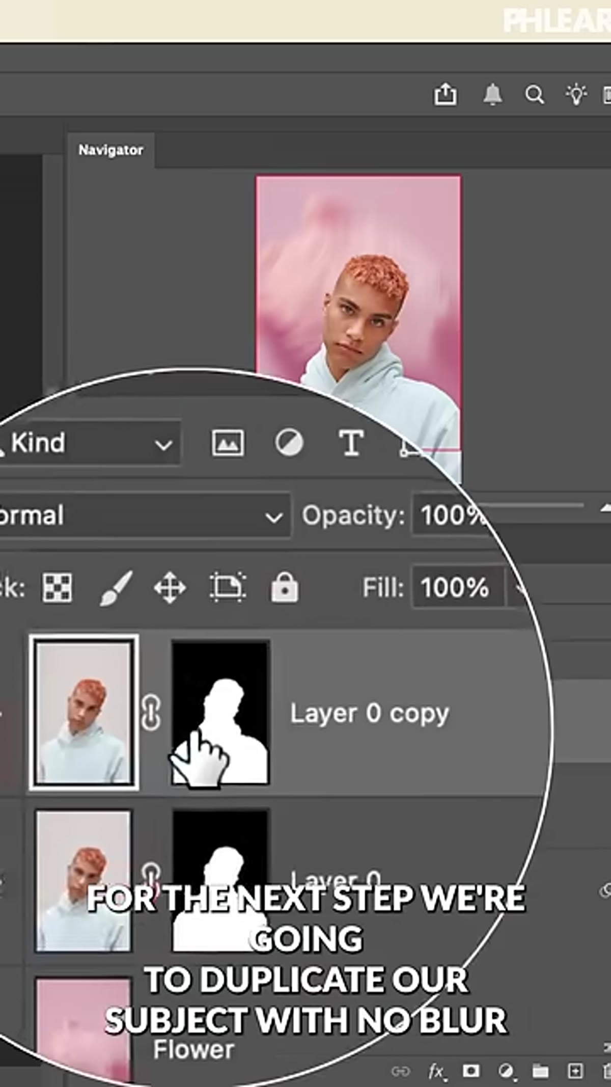 Black layer mask with white brush revealing sharp eyes on duplicate layer