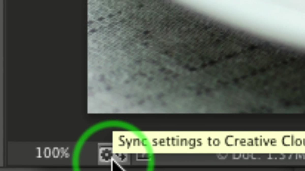 Photoshop status bar with sync settings icon highlighted
